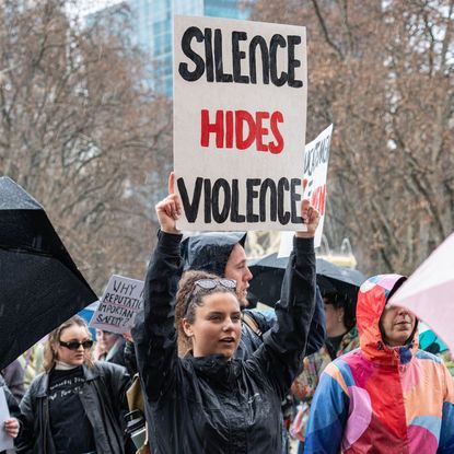 Protestors gather to demonstrate against violence against women